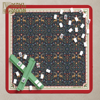 Midnight blue Christmas Mahjong mat with woodland deer, evergreen foliage, stars, red edging and festive holly details.