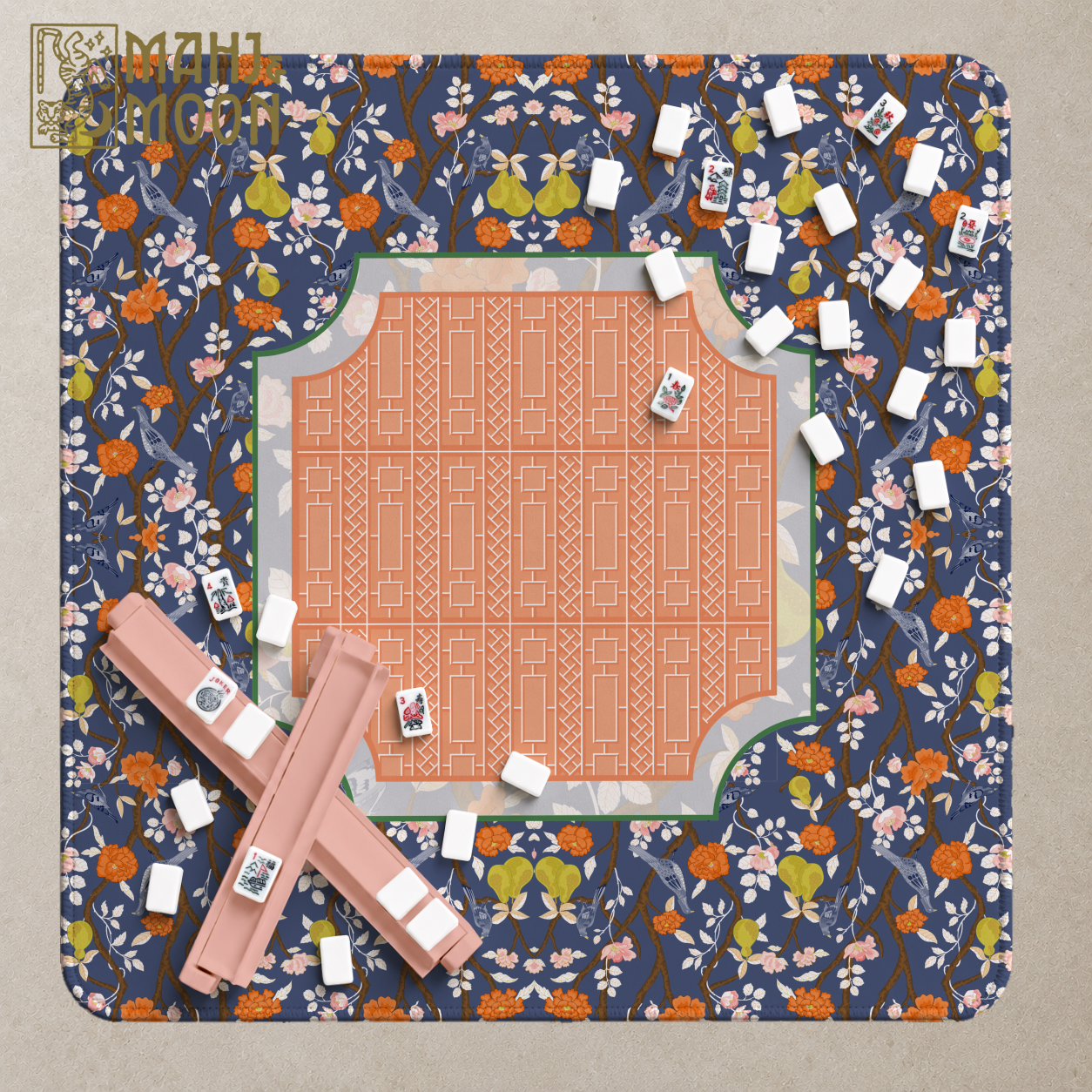 Navy chinoiserie American Mahjong mat with birds, pears, pink and orange flowers and a contrasting coral geometric centre.