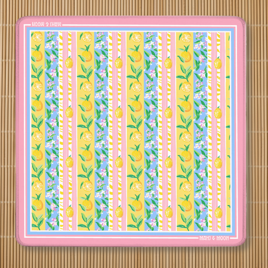 Lemon Stripe American Mahjong mat featuring citrus fruit, floral stripes and a pink border on a premium playing surface.