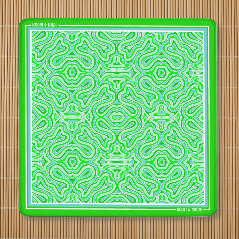 Green Retro American Mahjong mat featuring a bold Mid-Century Modern geometric pattern in green, aqua and white with a premium stitched edge.