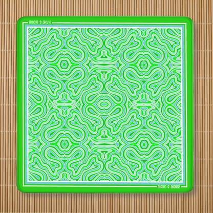 Green Retro American Mahjong mat featuring a bold Mid-Century Modern geometric pattern in green, aqua and white with a premium stitched edge.