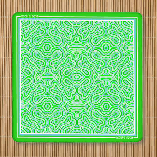 Green Retro American Mahjong mat featuring a bold Mid-Century Modern geometric pattern in green, aqua and white with a premium stitched edge.