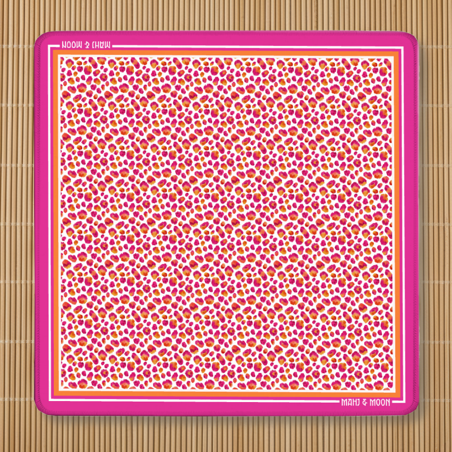 Pink Leopard Mahjong Mat with vibrant fuchsia, coral and orange leopard print, premium American Mahjong playing mat with non-slip rubber backing.