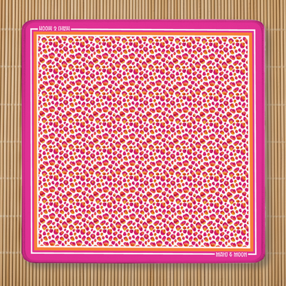 Pink Leopard Mahjong Mat with vibrant fuchsia, coral and orange leopard print, premium American Mahjong playing mat with non-slip rubber backing.