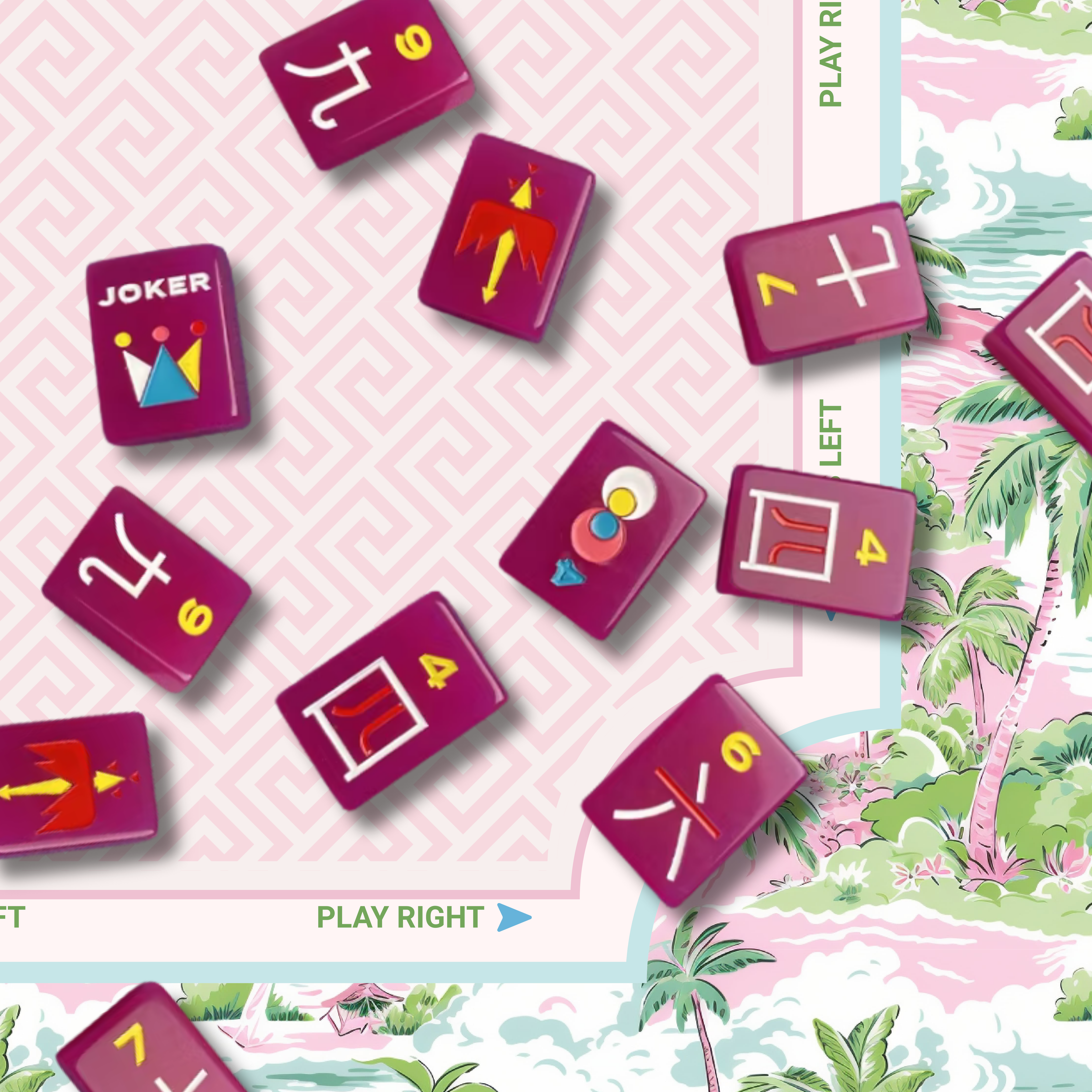 Pink mahjong tiles with symbols on a tropical themed mahjong mat